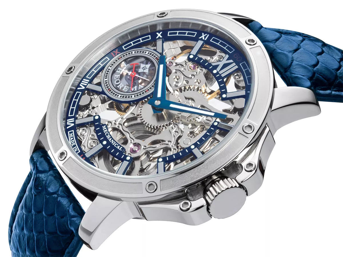 Silver case with silver button and Roman numerals in a genuine blue leather band.