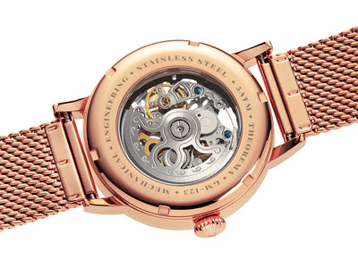 Open back that allows to see the silver automatic movement through the sapphire crystal.