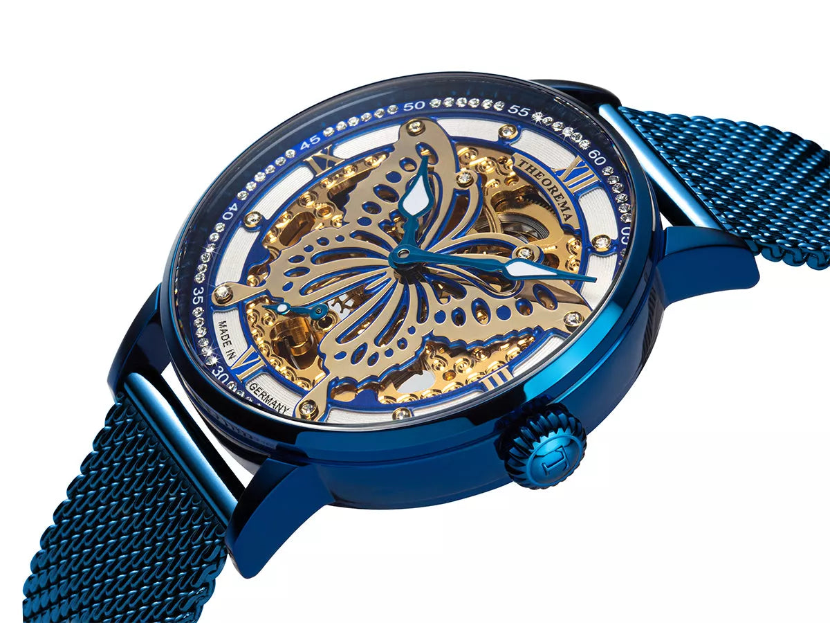 Blue case with white color bezel and blue stainless steel band.