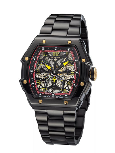 Engraved skeleton dial with Arabic numerals in a rectangular case.