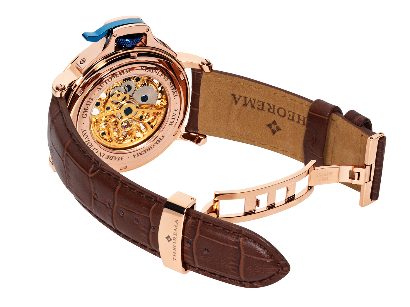 Open back case with gold color mechanism with all gears visible and deployment buckle for the band.